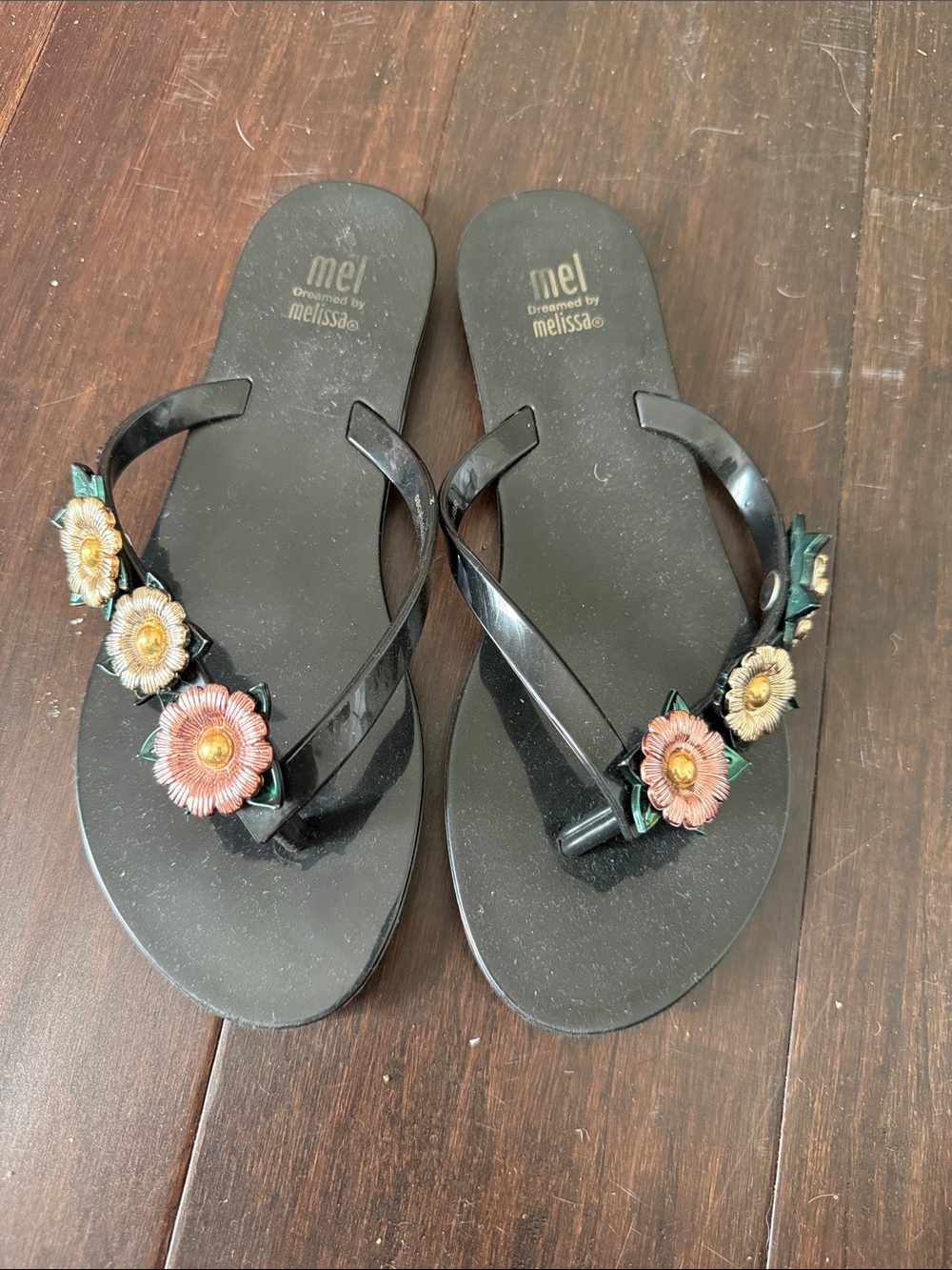 Mel dreamed by Melissa Black Jelly Flip Flops with Pink & Cream Floral Accents